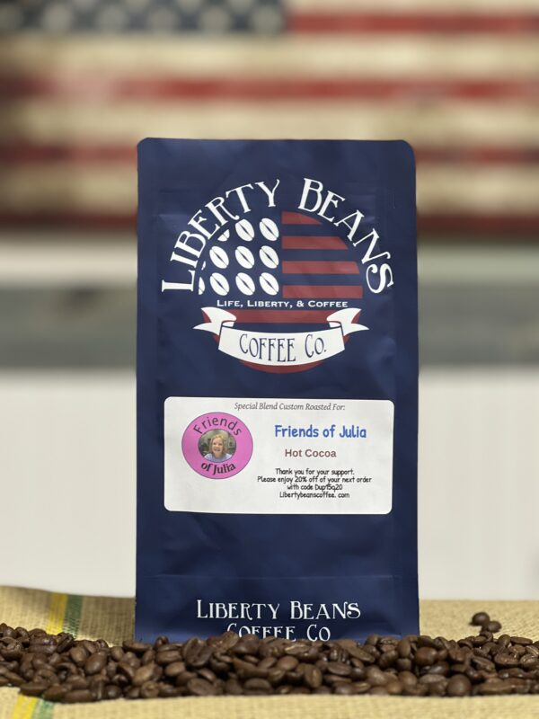 Liberty Beans coffee bag with American flag backdrop.