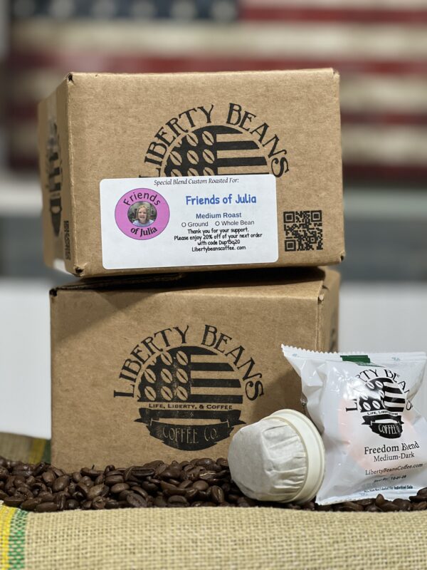 Liberty Beans Coffee packaging on burlap.