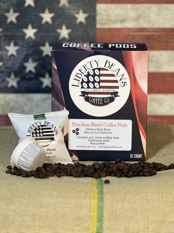 Liberty Beans coffee pods on flag background.