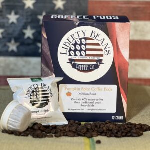 Pumpkin spice coffee pods with American flag background.