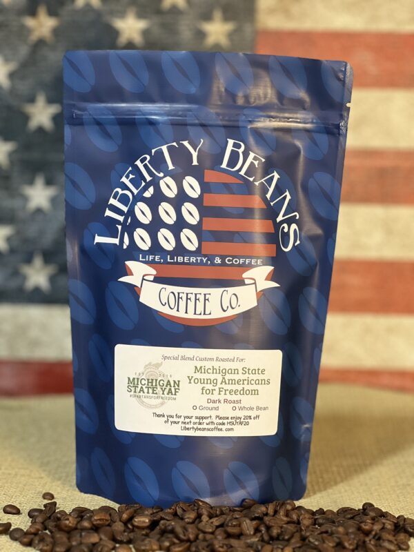 Bag of Liberty Beans coffee on American flag background.