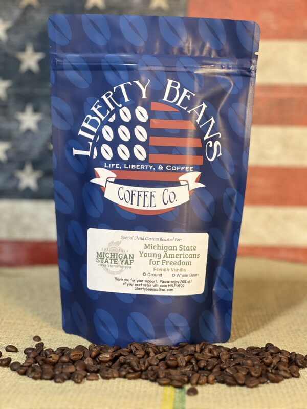 Liberty Beans coffee bag with coffee beans and flag.