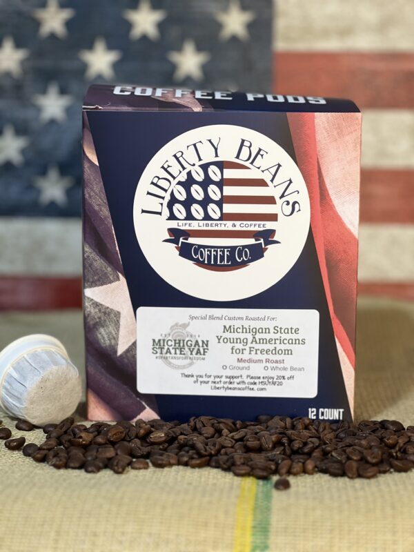 Liberty Beans coffee pods box with American flag background.