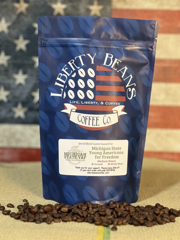 Liberty Beans coffee bag on American flag background.