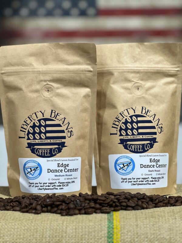 Liberty Beans Coffee bags with roasted coffee beans.