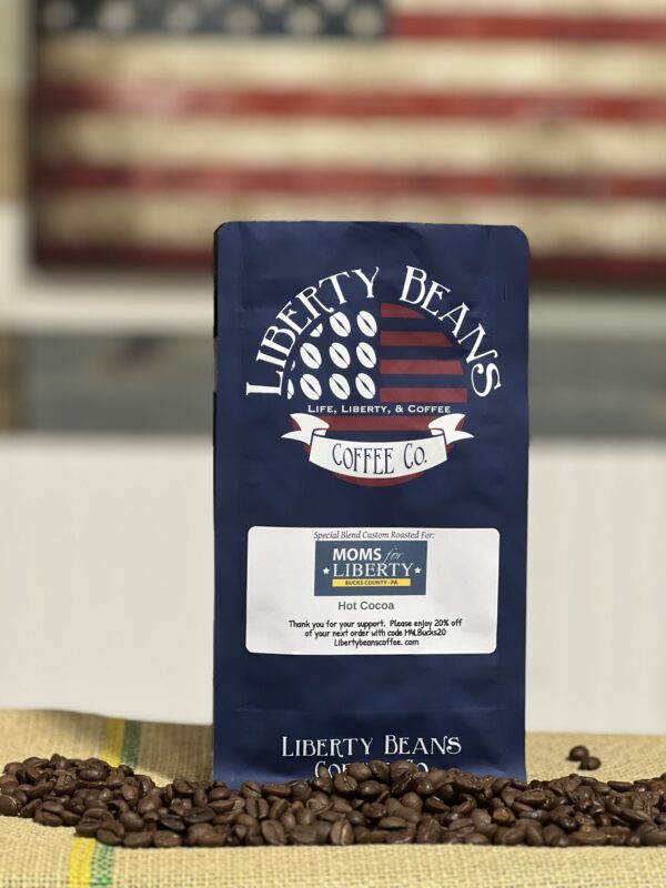 Liberty Beans coffee bag with American flag background.