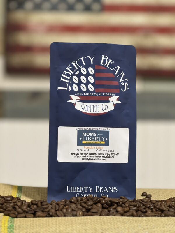 Liberty Beans coffee bag with roasted beans.