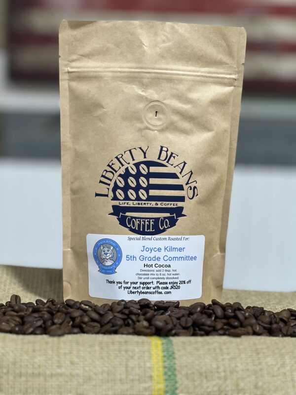 Liberty Beans coffee package with fresh roasted beans.