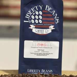 Liberty Beans coffee bag with roasted beans.